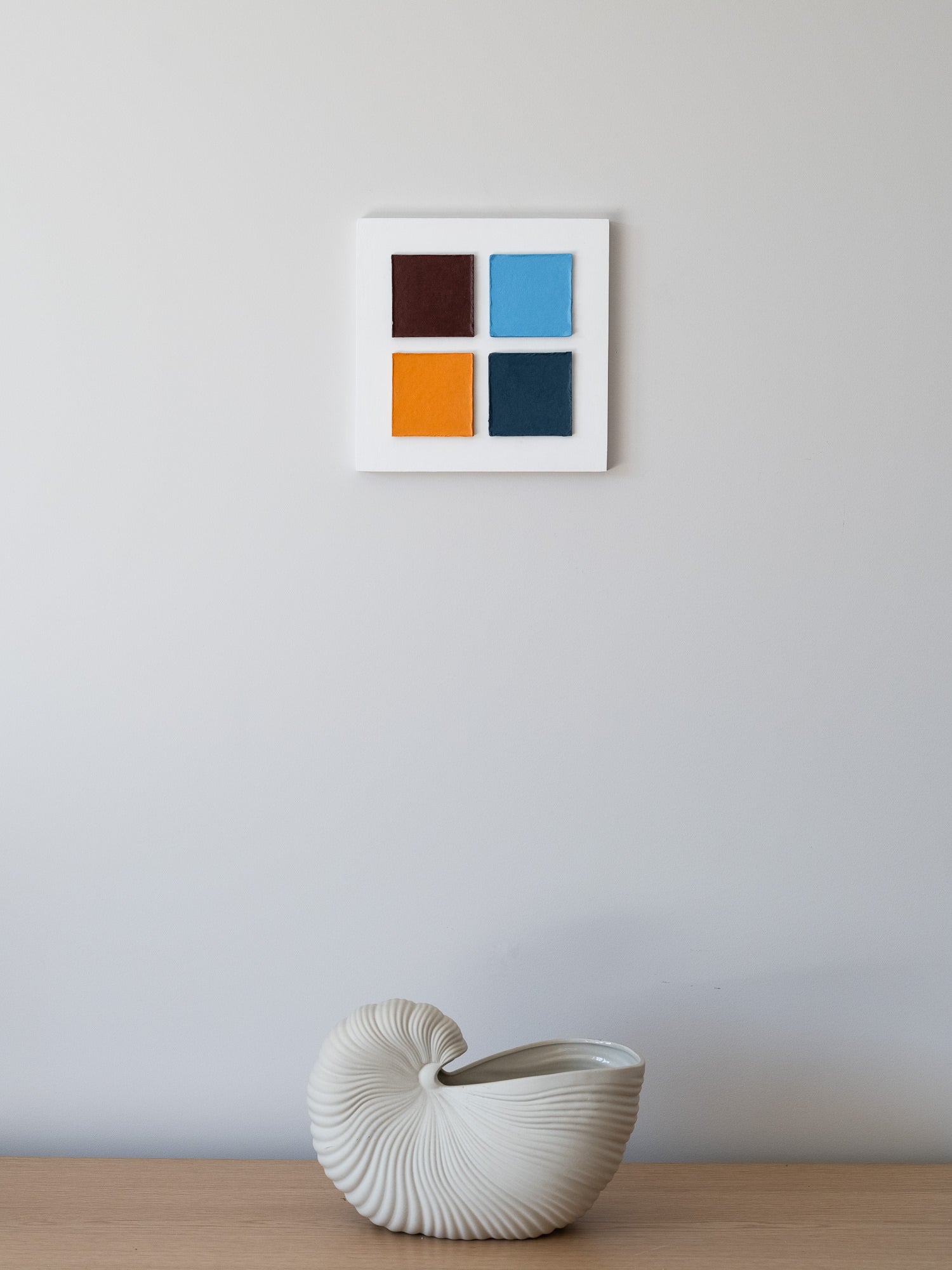 Bauhaus wall art Four Squares in Exile – Textured Cardboard on the wall 25 by 25 m