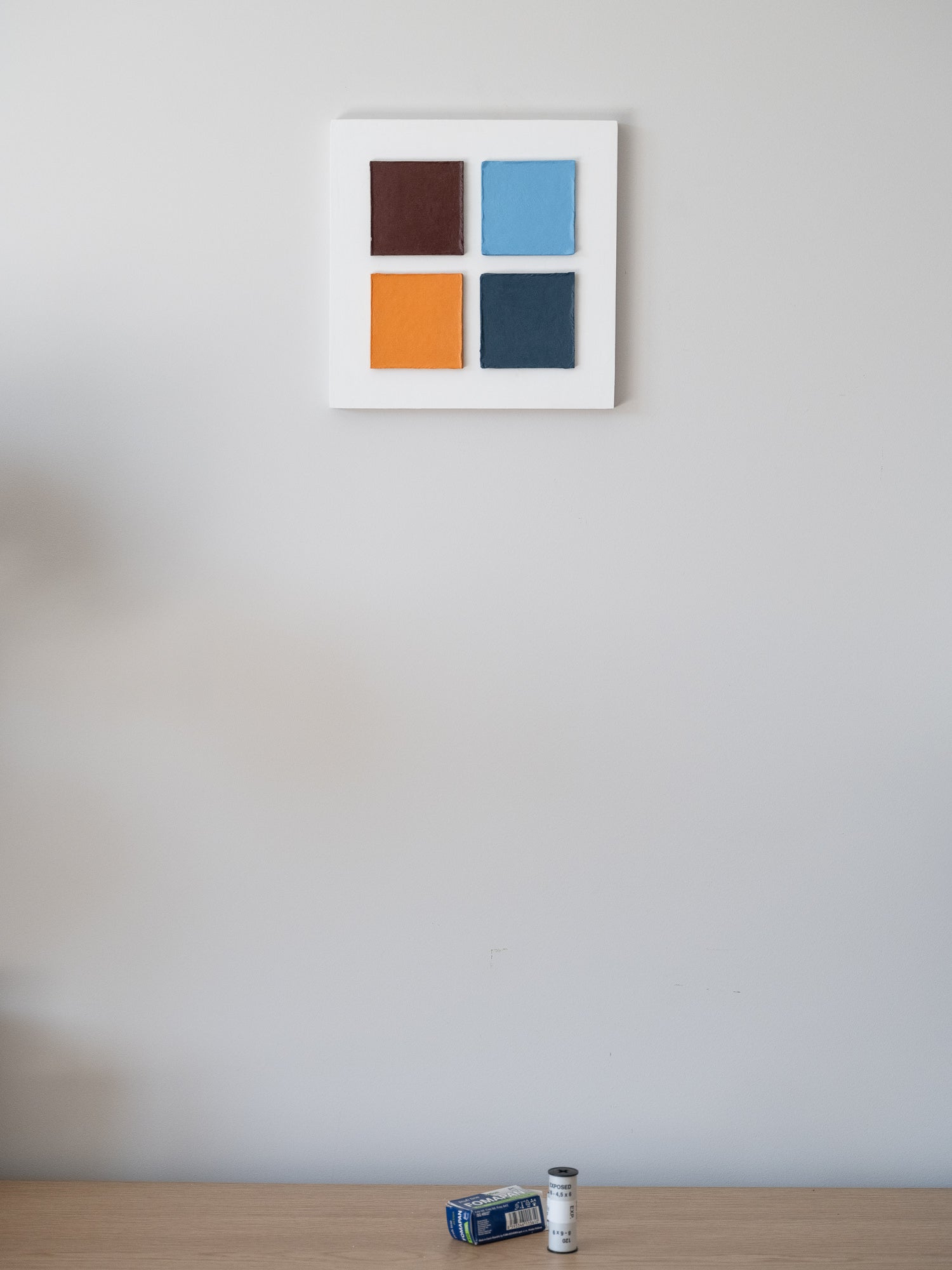 Four Squares in Exile – Textured Cardboard Wall Art 25 by 25 cm on the wall